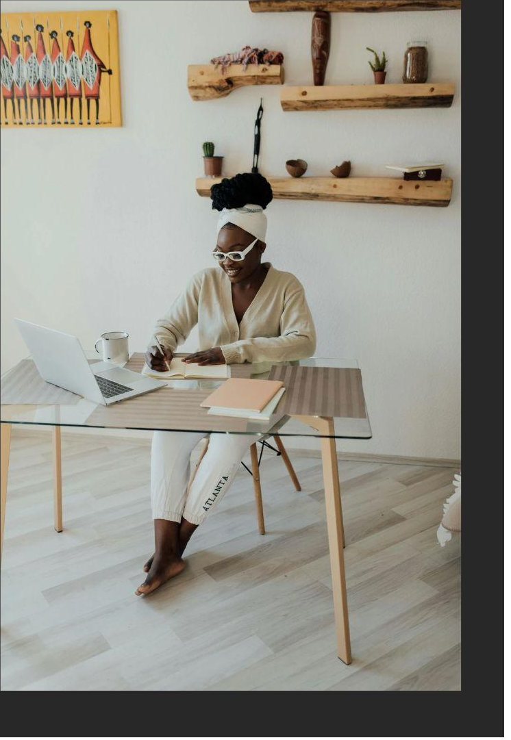 A scholarship participant working at her desk